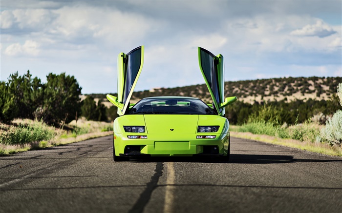 Зеленый Lamborghini суперкар вид спереди, крылья обои,s изображение