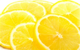 Плоды крупным планом, цитрусовые, ломтик лимона, желтый